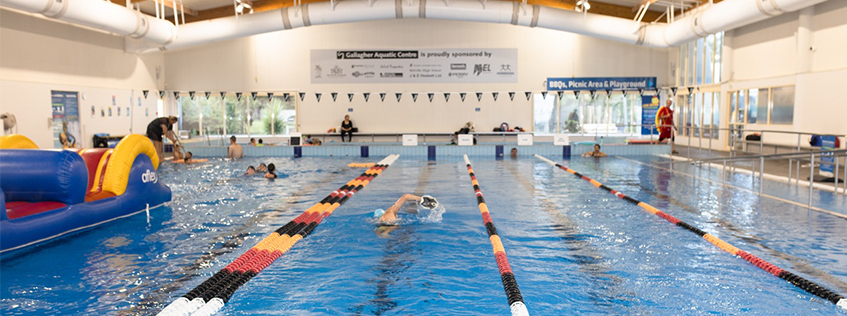 Image of people swimming at Gallagher Aquatic Centre