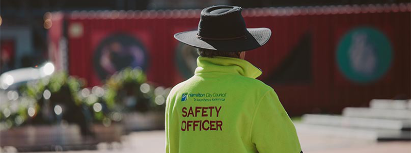 Image of a City Safe Officer with their back to the camera 